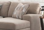 Close-up of Newellen Hemp upholstery and accent pillow