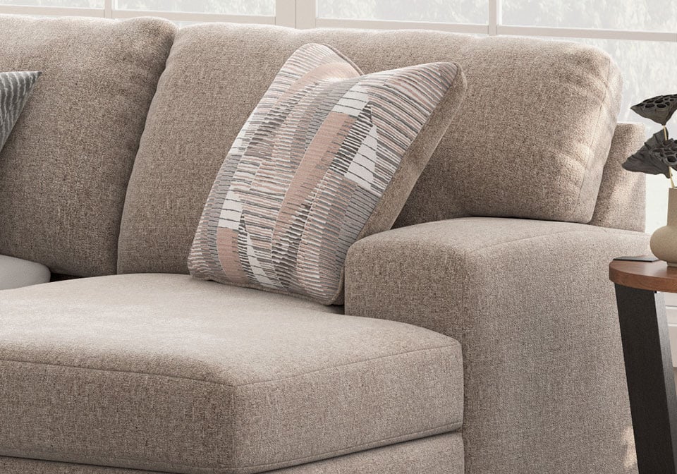 Close-up of Newellen Hemp upholstery and accent pillow