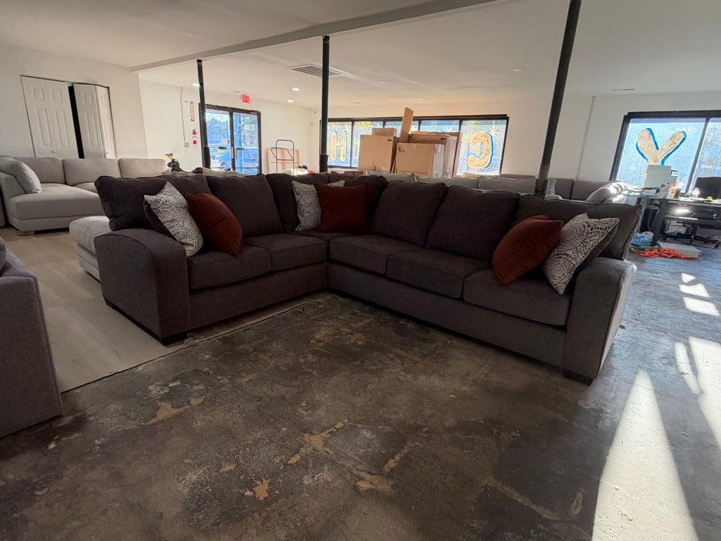 USA made dark gray sectional in the showroom