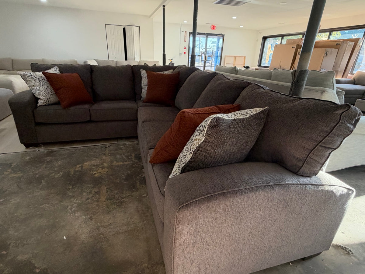 USA made dark gray sectional in the showroom